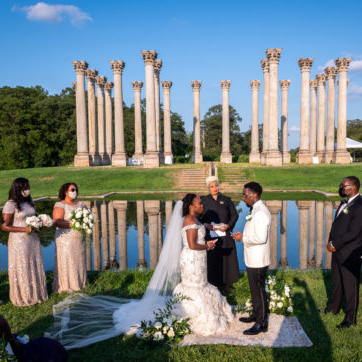 wedding ceremony in front of the capitol columns