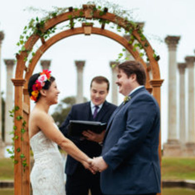 wedding ceremony in front of the capitol columns