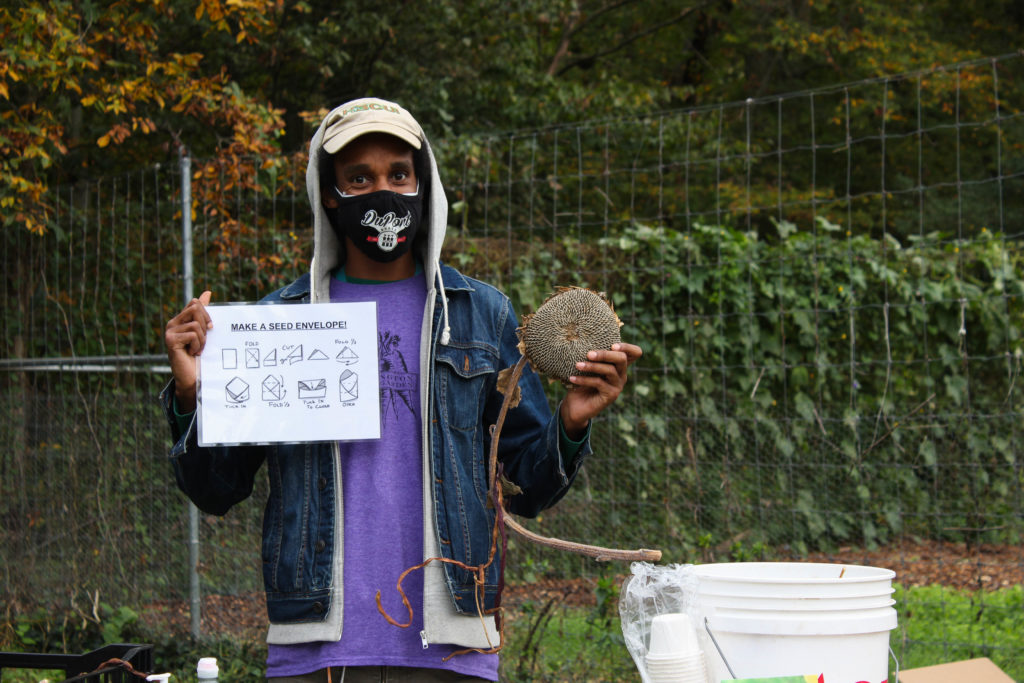 FONA staff lead activities at the garlic planting party in washington youth garden