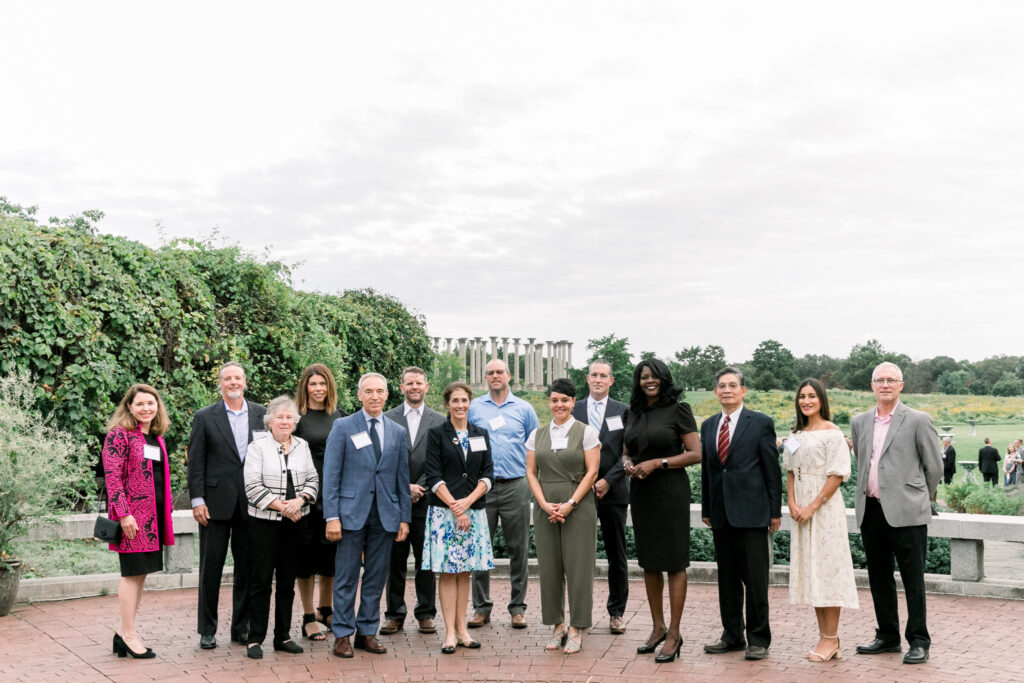 fona board, usda staff, and usna staff in posing together at the solstice soiree