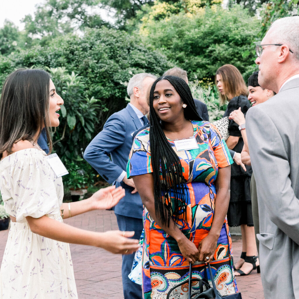 solstice soiree guests talking during cocktail hour