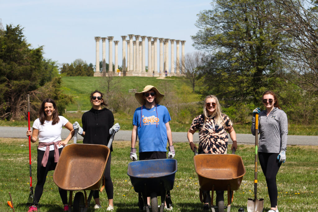 washington youth garden corporate volunteer group in front of the capitol columns