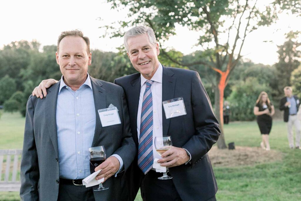 dinner under the stars attendees posing with drinks