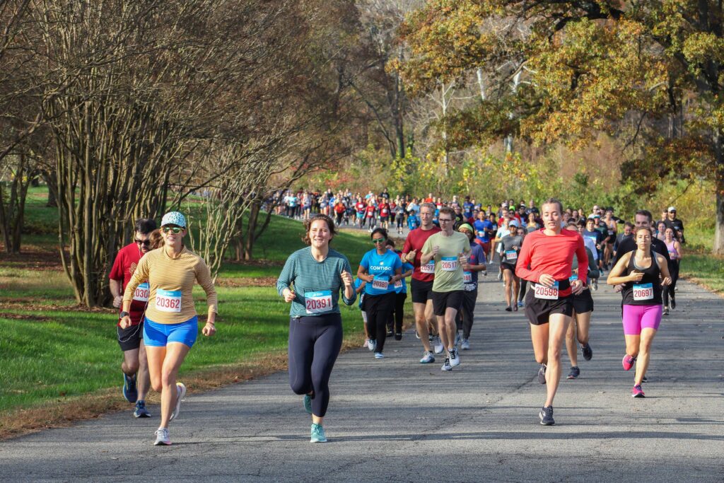 runners and walkers race in FONA's fall 5k