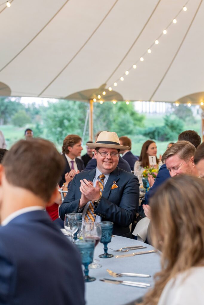 Department of Agriculture Deputy Secretary Stephen Alexander Vaden clapping at a table during Dinner Under the Stars