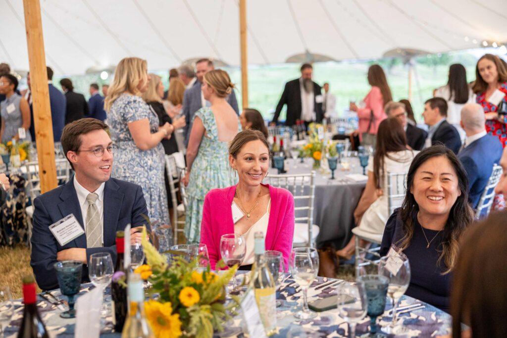 Dinner under the stars guests conversing at a table