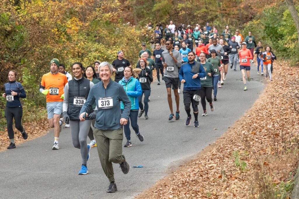 5K runners racing downhill